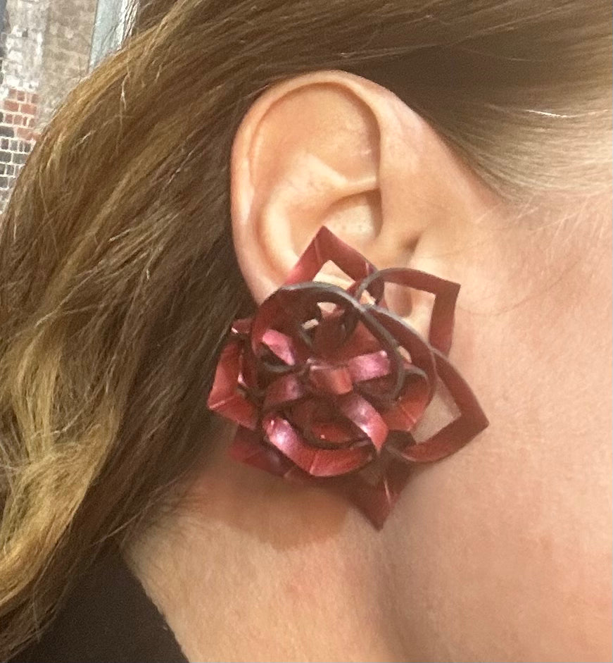 Rubber rose ear studs