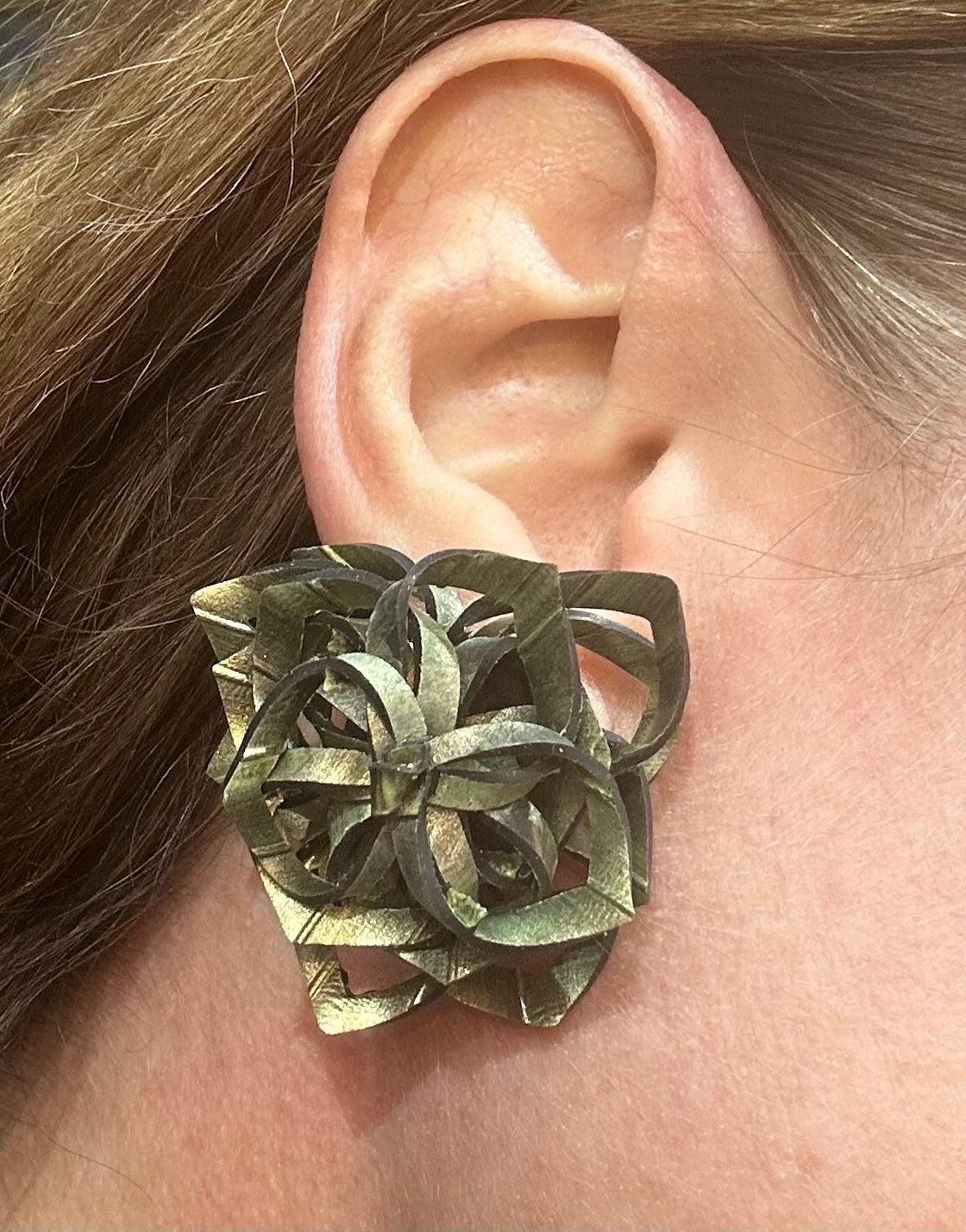 Rubber rose ear studs