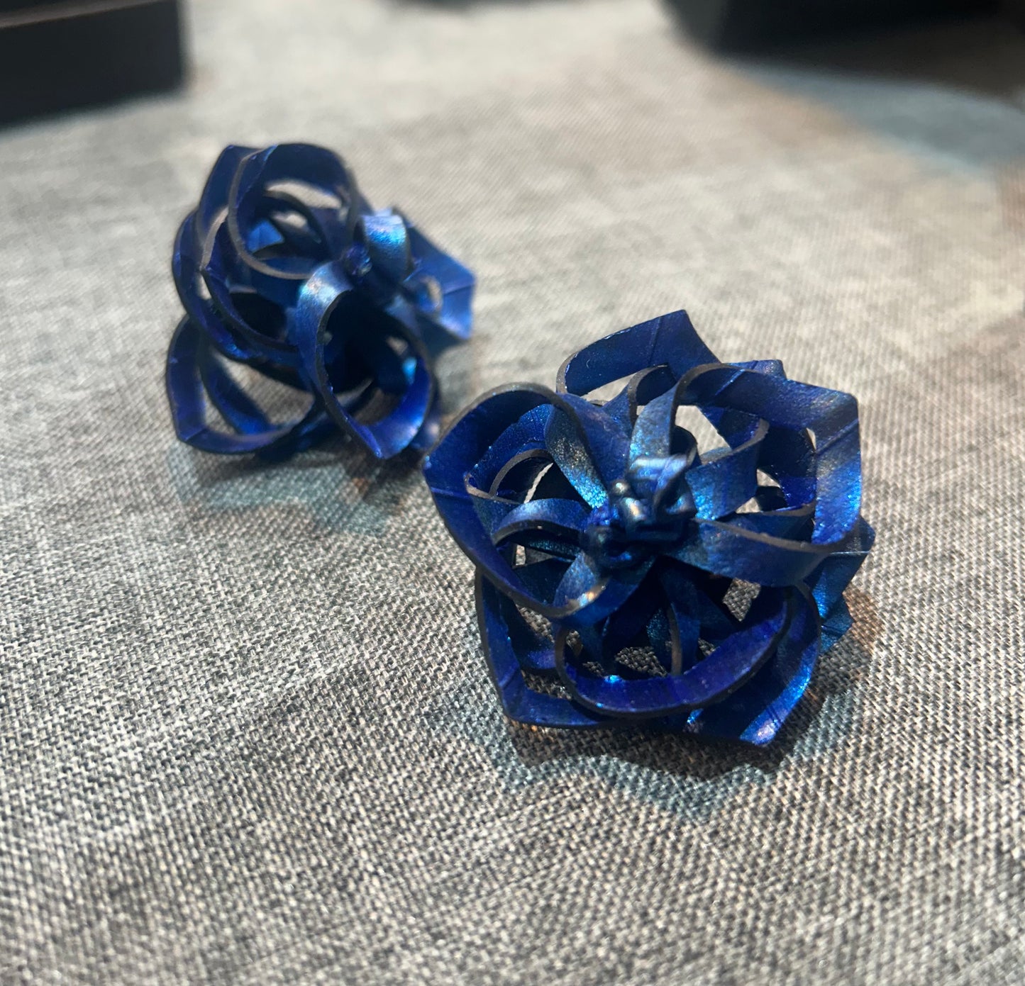 Rubber rose ear studs