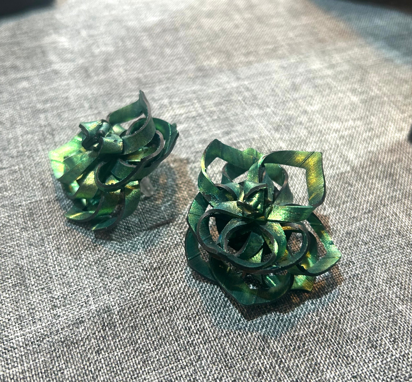 Rubber rose ear studs